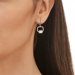 Load image into Gallery viewer, 0.65 Karat Baguette Stone Set Diamond Earrings