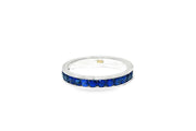 White Gold Eternity Ring with Deep Blue Sapphire