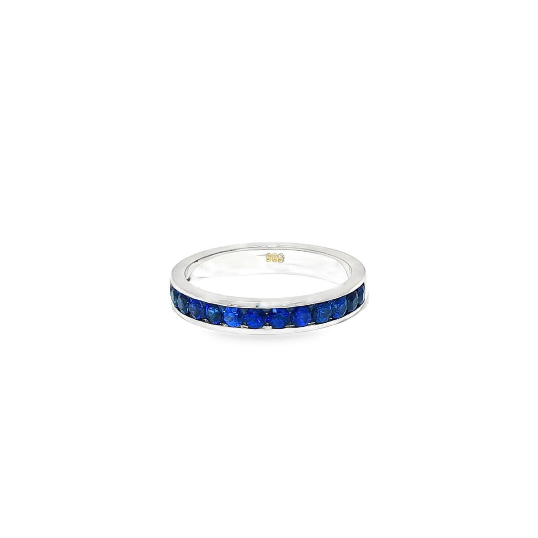 White Gold Eternity Ring with Deep Blue Sapphire