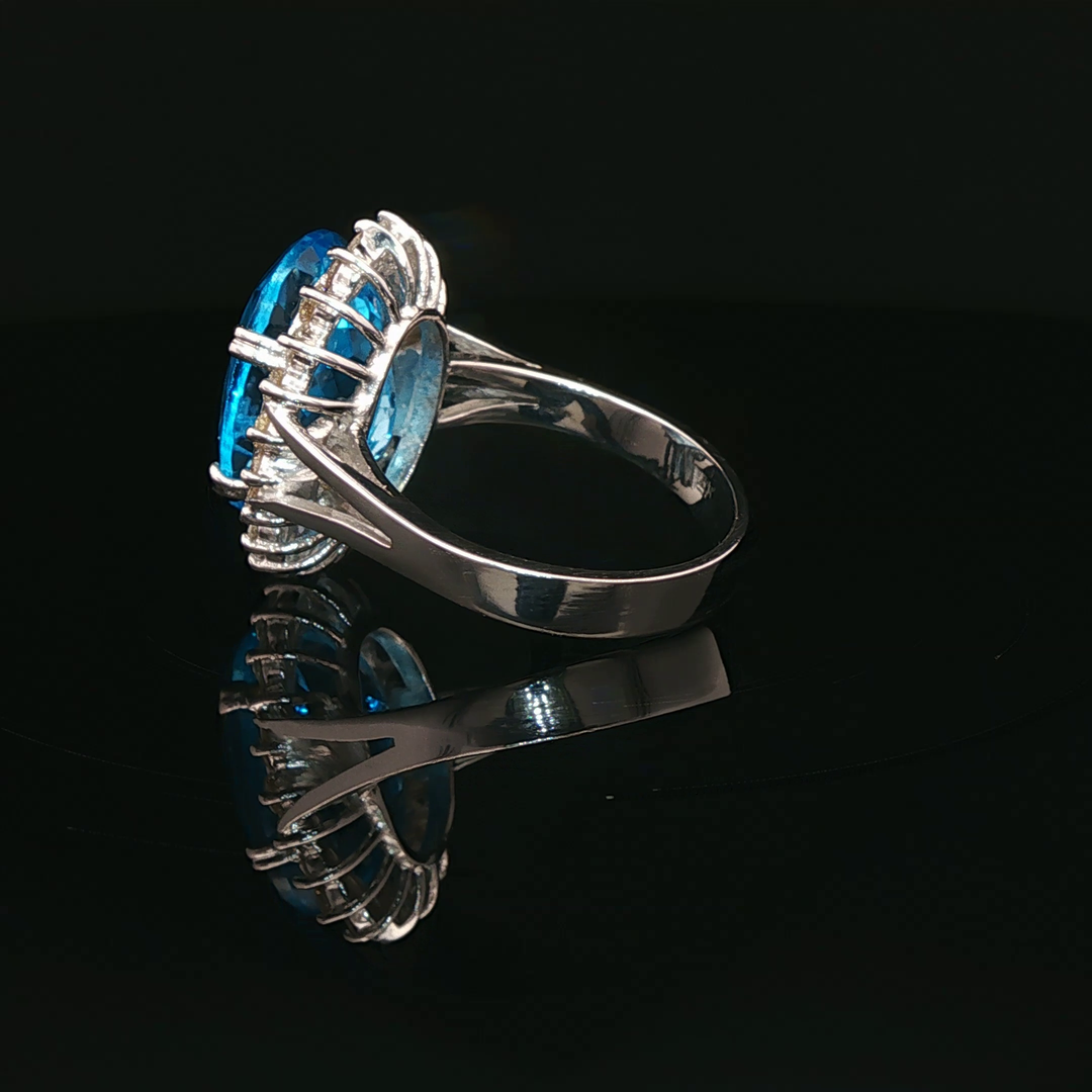 White Gold Ring with Brilliant Cut Blue Topaz and Diamon