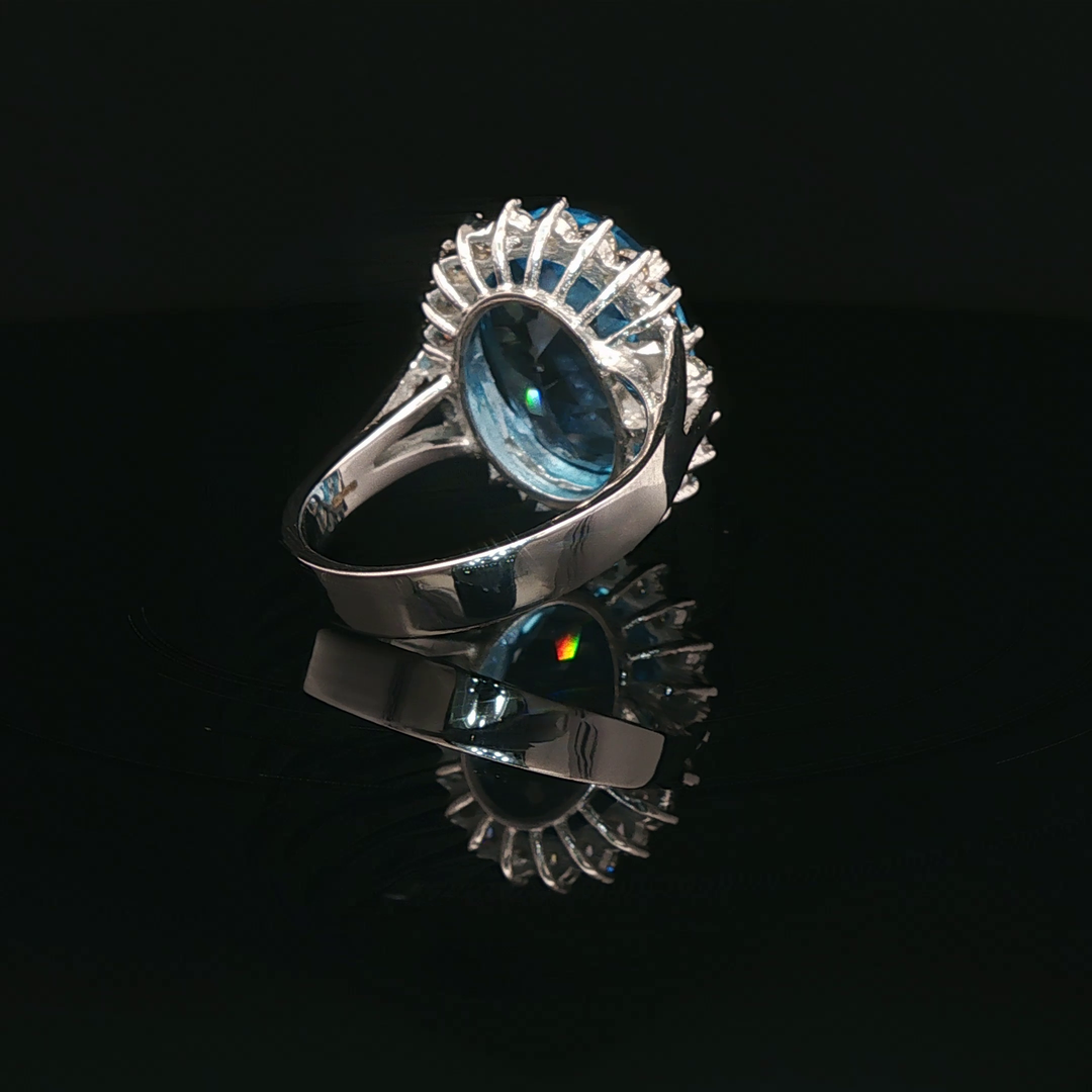 White Gold Ring with Brilliant Cut Blue Topaz and Diamon