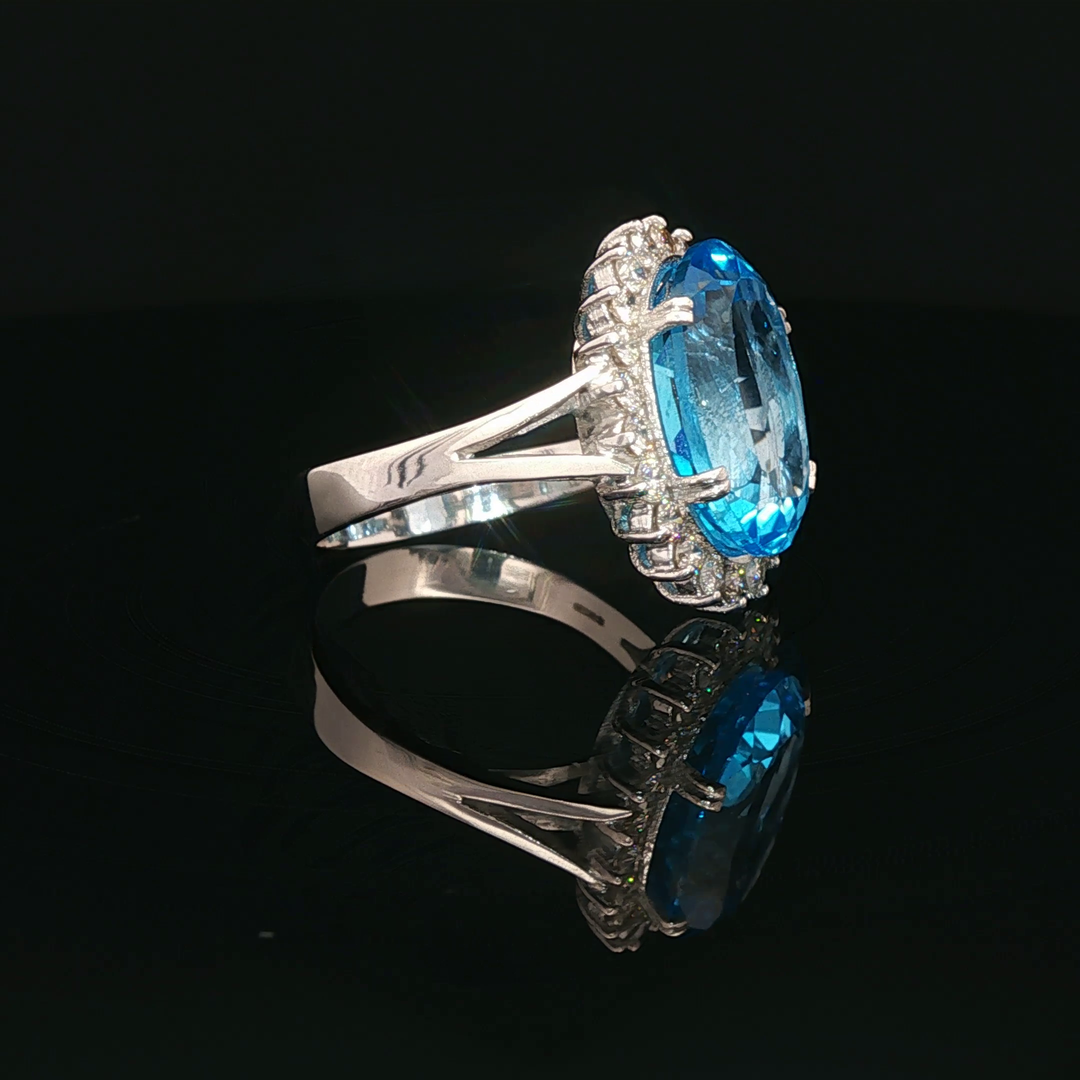 White Gold Ring with Brilliant Cut Blue Topaz and Diamon