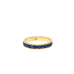 Load image into Gallery viewer, Yellow Gold Eternity Ring with Deep Blue Round Sapphire