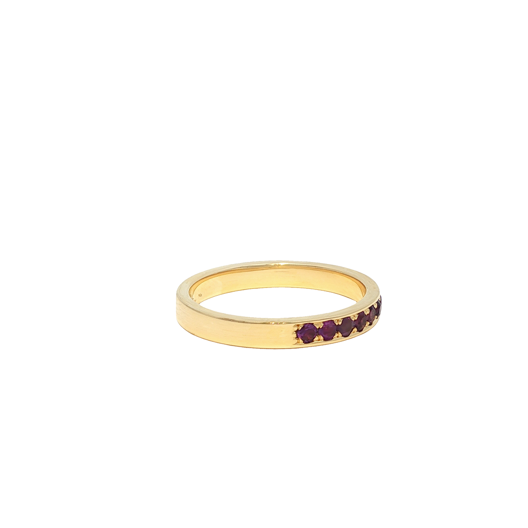 Yellow Gold Eternity Ring with Round Cut Ruby Gemstones