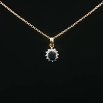 Load image into Gallery viewer, Yellow Gold Necklace with Deep Blue Oval Sapphire Charm