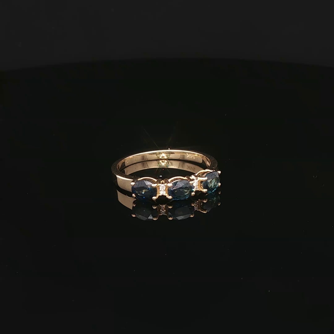 Yellow Gold Ring with Deep Blue Sapphire Cabochons