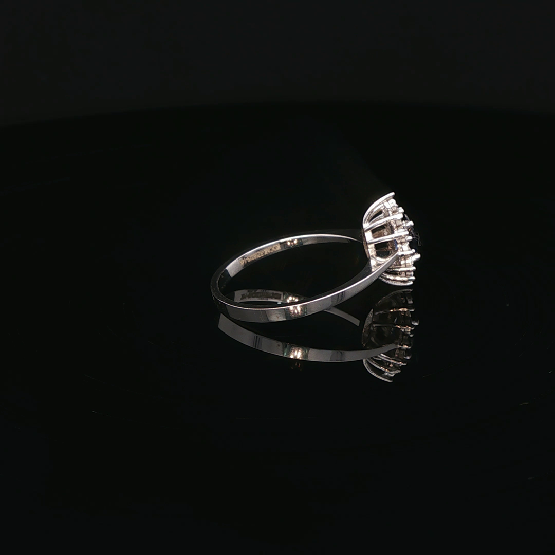 14ct White Gold Ring with Oval Cut Blue Sapphire & Diamonds