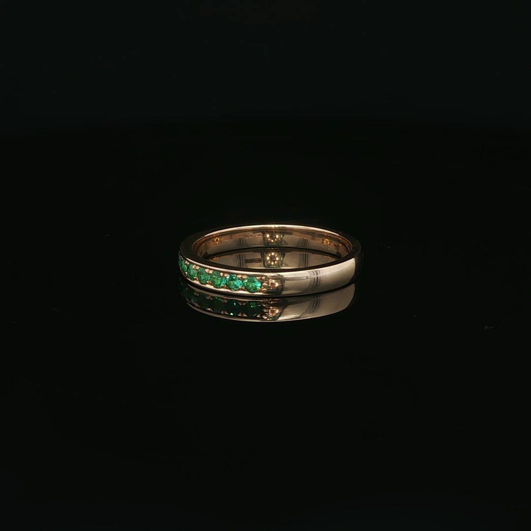 Yellow Gold Eternity Ring with Round Cut Emeralds