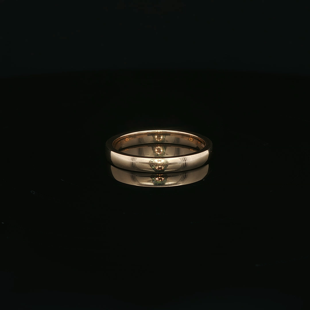 Yellow Gold Eternity Ring with Round Cut Emeralds