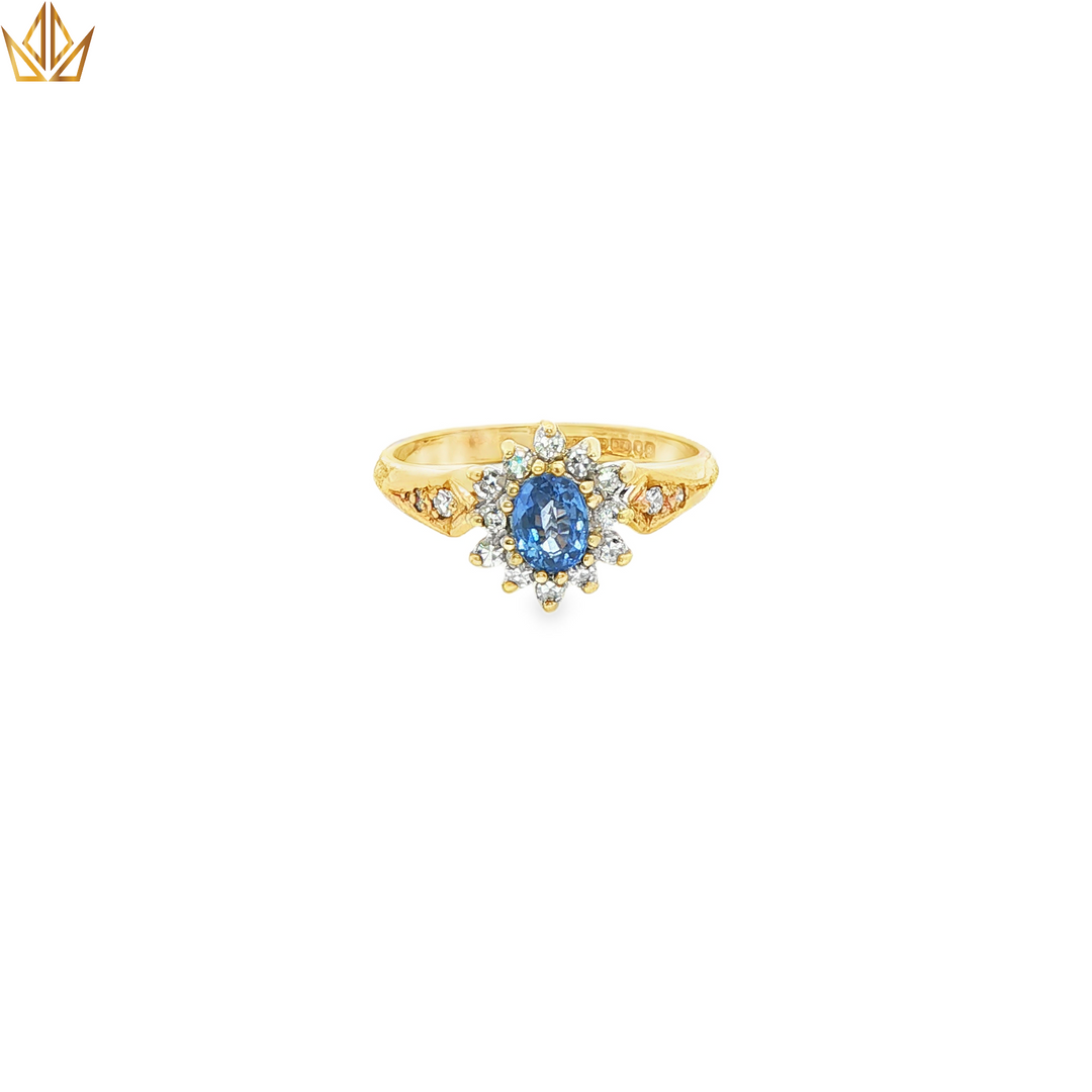 Yellow Gold Cocktail Ring with Light Blue Oval Sapphire