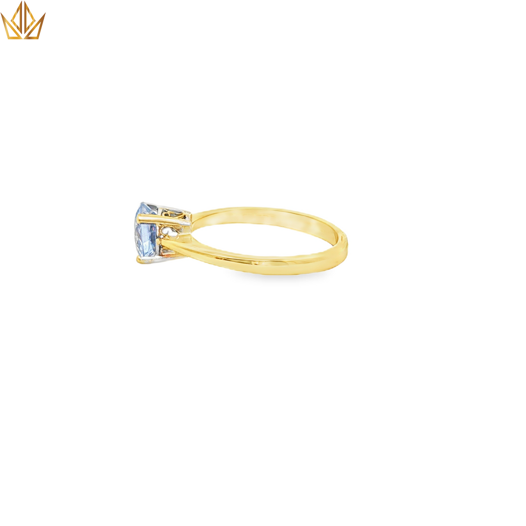 18ct Gold Solitaire Ring with Round Light Blue Sapphire