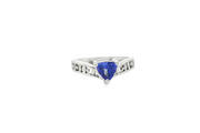 18ct White Gold Ring with Trillion Cut Blue Tanzanite