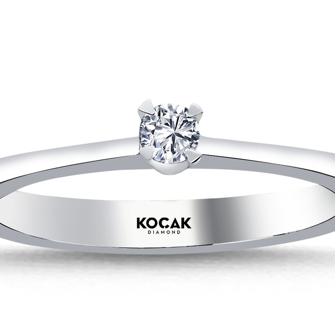 0.10 Karat EF SI Solitaire Diamond Ring