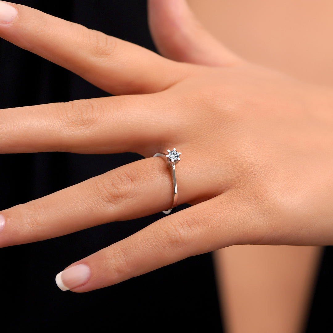 0.15 Karat EF SI Solitaire Diamond Ring
