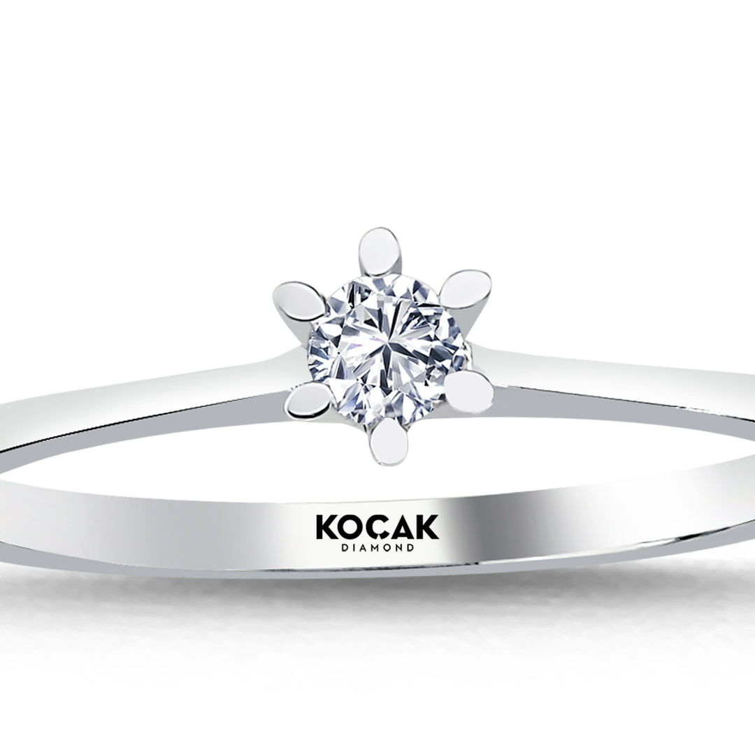 0.10 Karat EF SI Solitaire Diamond Ring