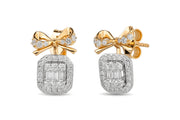 0.57 Karat FG SI Diamond Baguette Earrings