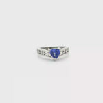 Load and play video in Gallery viewer, 18ct White Gold Ring with Trillion Cut Blue Tanzanite