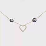 Load and play video in Gallery viewer, Yellow Gold Diamond Heart and Evil Eye Charm Necklace