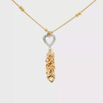 Load and play video in Gallery viewer, Yellow Gold CZ Heart Charm Necklace