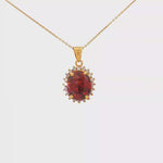 Load and play video in Gallery viewer, 14ct Yellow Gold Charm Necklace with Oval Garnet