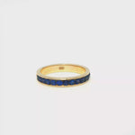 Load and play video in Gallery viewer, Yellow Gold Eternity Ring with Deep Blue Sapphires