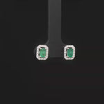 Load and play video in Gallery viewer, Elegant Emerald Step Cut White Gold Stud Earrings
