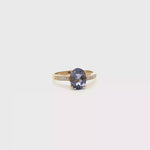 Load and play video in Gallery viewer, 9ct  Gold Ring with Oval Tanzanite and Accents