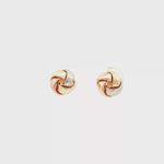 Load and play video in Gallery viewer, Yellow Gold Love Knot Stud Earrings