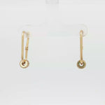Load and play video in Gallery viewer, Yellow Gold Hoop Earrings with Round Brilliant CZ