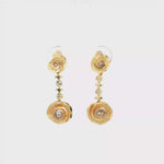 Load and play video in Gallery viewer, Yellow Gold Dangle Earrings with Round Brilliant Cut Diamonds