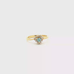 Load and play video in Gallery viewer, 18ct Gold Ring with Trillion Cut Aquamarine