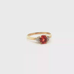 Load and play video in Gallery viewer, 9ct Yellow Gold Ring with Round Cut Orange Spinel