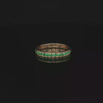 Load and play video in Gallery viewer, Yellow Gold Eternity Ring with Round Cut Emeralds