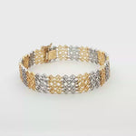 Load and play video in Gallery viewer, Two-Tone Geometric Link Chain Bracelet in Yellow Gold