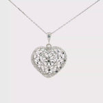 Load and play video in Gallery viewer, White Gold Filigree Heart Charm Necklace