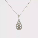 Load and play video in Gallery viewer, White Gold Celtic Knot and Claddagh Charm Necklace