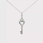 Load and play video in Gallery viewer, Elegant White Gold Key Charm Necklace