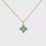 Load and play video in Gallery viewer, Yellow Gold Charm Necklace with Bluish Turquoise Flower Pendant