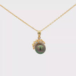 Load and play video in Gallery viewer, Yellow Gold Necklace with Round Dark Green Pearl Pendant