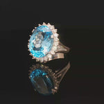 Load and play video in Gallery viewer, White Gold Ring with Brilliant Cut Blue Topaz and Diamon
