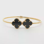Load and play video in Gallery viewer, Yellow Gold Bangle with Onyx Clover Accents