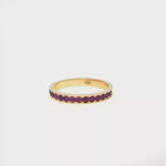 Load and play video in Gallery viewer, Yellow Gold Eternity Ring with Round Brilliant Cut Rubies