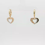 Load and play video in Gallery viewer, Yellow Gold Hoop Earrings with Bi-Color Heart
