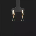 Load and play video in Gallery viewer, Yellow Gold Dangle Earrings with Pear-Shaped Blue Sapphires