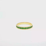 Load and play video in Gallery viewer, Yellow Gold Eternity Ring with Round Cut Emeralds