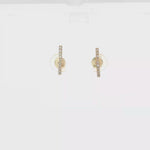 Load and play video in Gallery viewer, Gold Stud Earrings with Round Brilliant Cut CZ