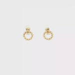 Load and play video in Gallery viewer, Yellow Gold Twisted Hoop Earrings